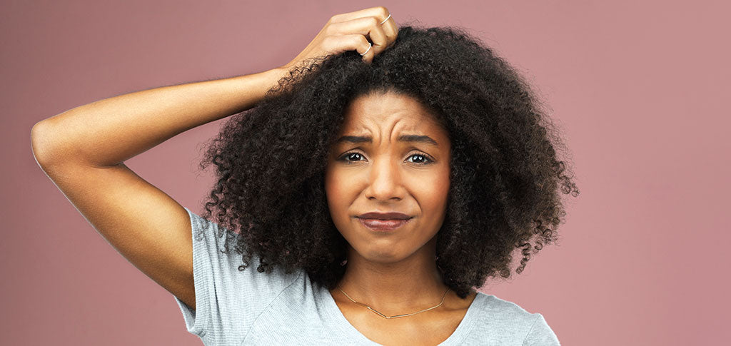 What's Causing Flakes in Your Hair and How to Treat Them –